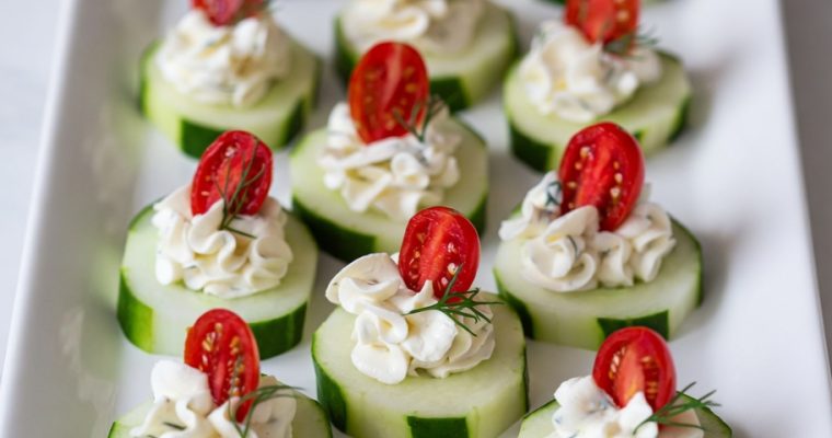 CUCUMBER BITES WITH HERB CREAM CHEESE AND CHERRY TOMATOES
