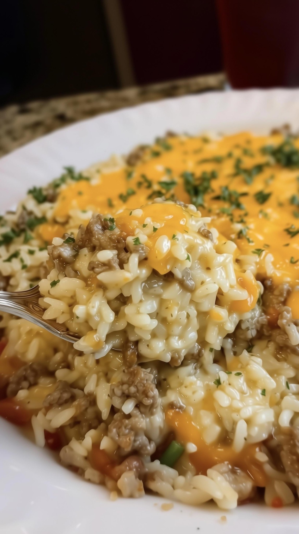 CHEESY GROUND BEEF RICE CASSEROLE