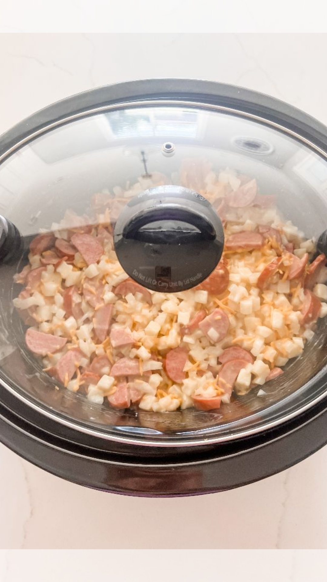 SLOW COOKER HASHBROWN AND KIELBASA CASSEROLE