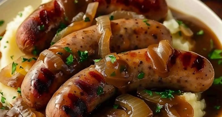 Classic British Sausages with Creamy Mash and Rich Onion Gravy