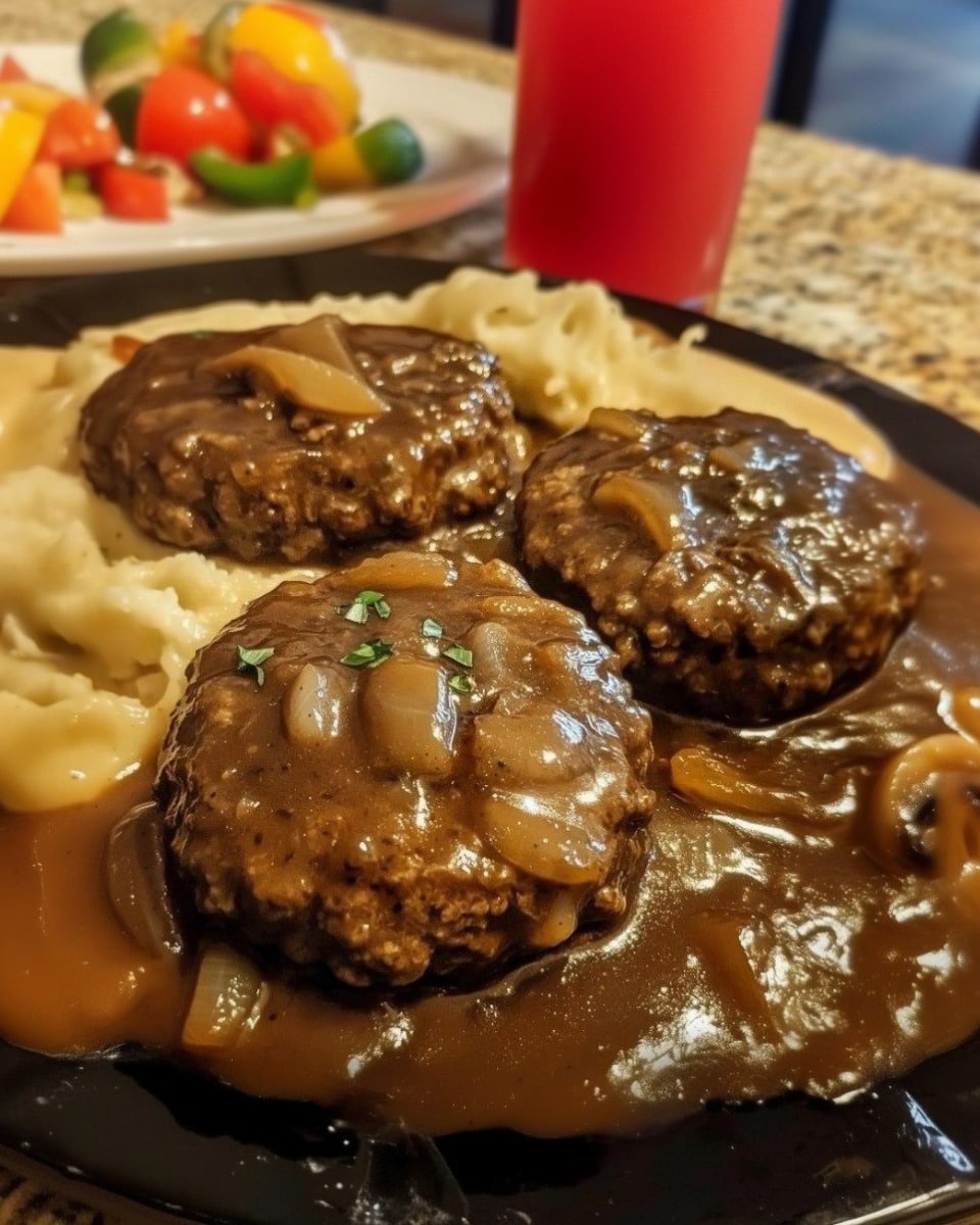 Salisbury Steak with Garlic Mashed Potatoes and Mushroom Gravy